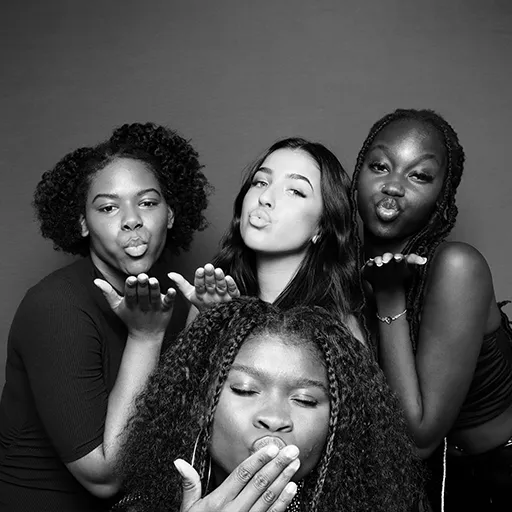 Happy guests posing at a wedding with Olive Branch Photo Booths in California.
